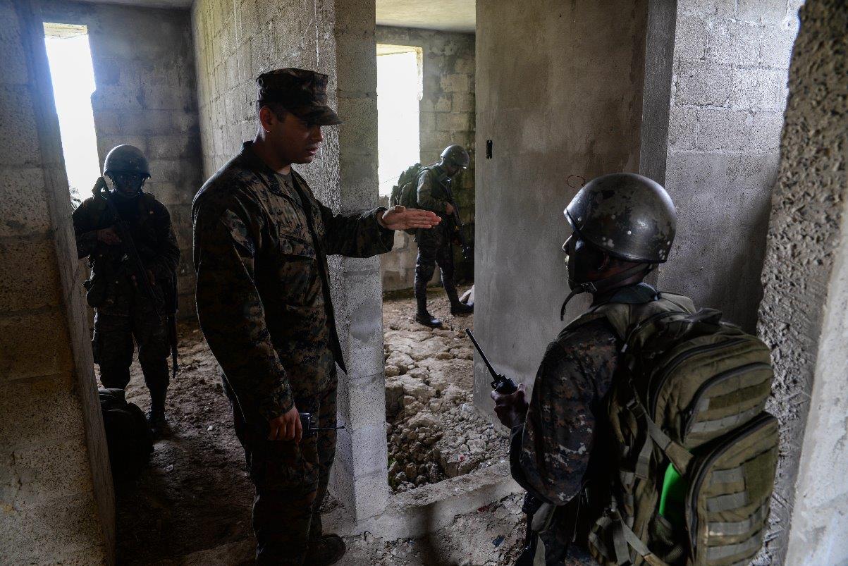 U.S. Marine Staff Sgt. Jorge Avila, instructor, gives directions to a Guatemalan Marine during a training exercise March 9, 2016, Guatemala.